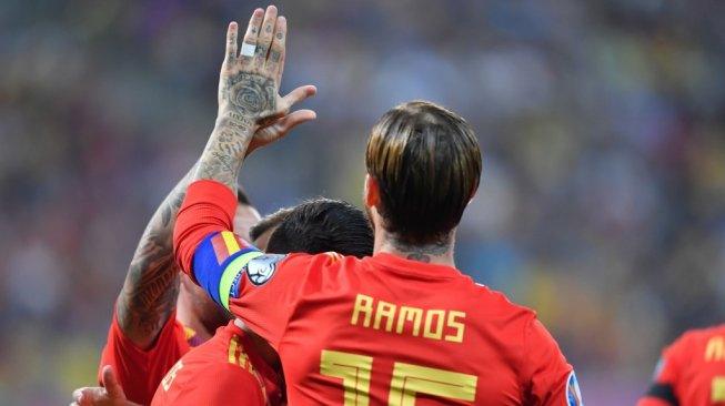 Bek andalan sekaligus kapten Timnas Spanyol, Sergio Ramos. [Daniel MIHAILESCU / AFP]
