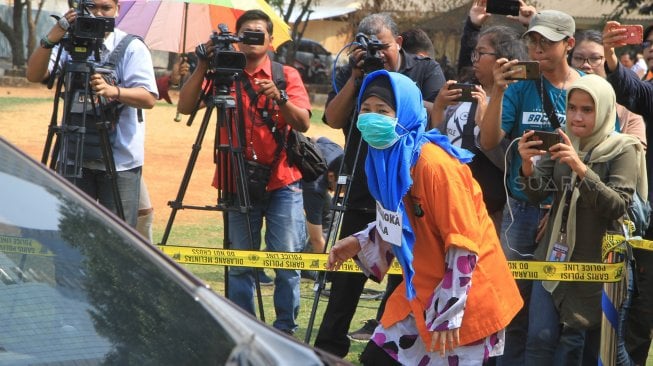 Begini Suasana Rekonstruksi Kasus Istri Bakar Suami dan Anak Tiri