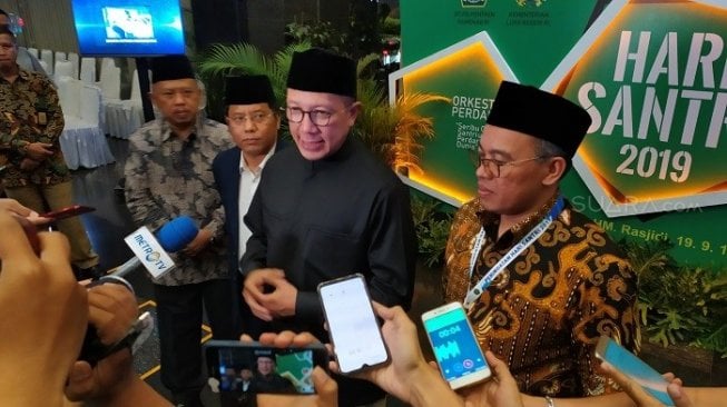 Menteri Agama Lukman Hakim Saifuddin saat ditemui wartawan di Balai Diklat Kemenag. (Suara.com/Stephanus Aranditio).