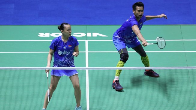 Pasangan ganda campuran Indonesia, Tontowi Ahmad/Winny Oktavina Kandow, mengalahkan finalis Olimpiade 2016, Chan Peng Soon/Goh Liu Ying (Malaysia), di babak kedua China Open 2019, Kamis (19/9). [Humas PBSI]