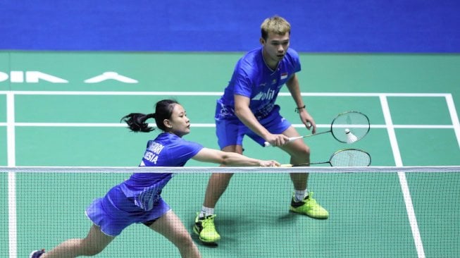 Pasangan ganda campuran Indonesia, Rinov Rivaldy/Pitha Haningtyas Mentari, kalah di babak kedua China Open 2019 dari Seo Seung Jae/Chae Yujung (Korsel), Kamis (19/9). [Humas PBSI]