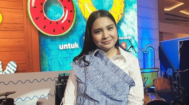 Putri Titian berbagi tips liburan bareng anak balita. (Suara.com/Dini Afrianti)