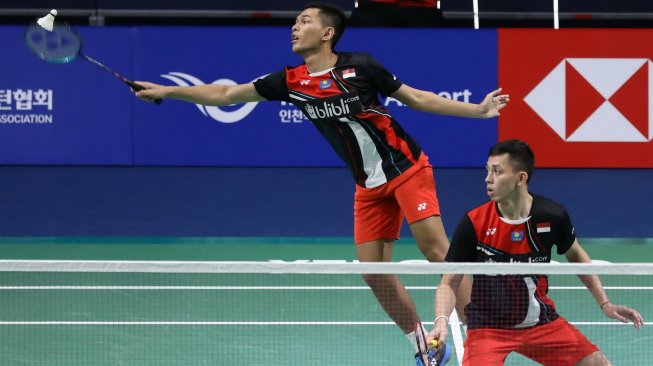 Pasangan ganda putra Indonesia, Fajar Alfian/Muhammad Rian Ardianto, lolos ke perempat final Korea Open 2019 usai mengalahkan Lee Yang/Wang Chi Lin (Taiwan) di babak kedua, Kamis (26/9). [Humas PBSI]