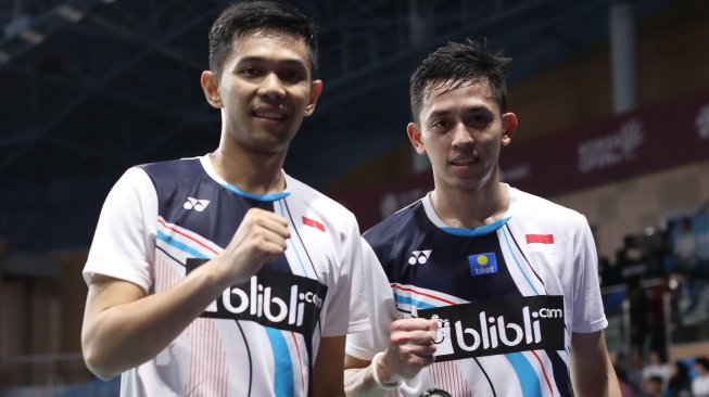 Pasangan ganda putra Indonesia, Fajar Alfian/Muhammad Rian Ardianto, menghentikan perlawanan kompatriotnya, Kevin Sanjaya Sukamuljo/Marcus Fernaldi Gideon, di perempat final Korea Open 2019, Jumat (27/9). [Humas PBSI]