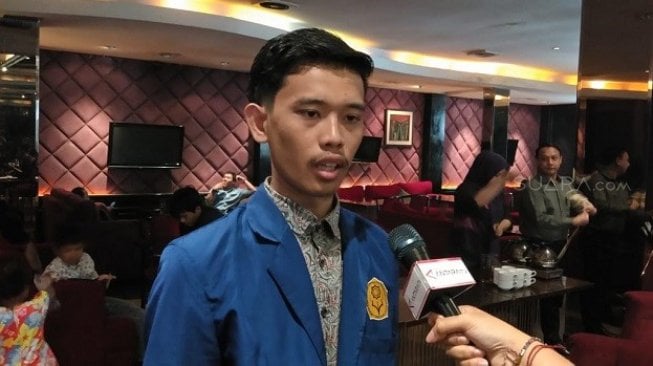 Andi Prayoga, mahasiswa STEBANK Islam Jakarta. (Suara.com/Ria Rizki).