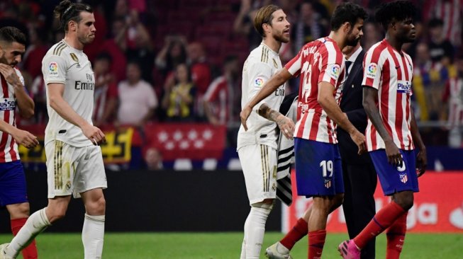 Suasana setelah laga Liga Spanyol 2019/2020 antara Atletico Madrid vs Real Madrid berakhir di Estadio Wanda Metropolitano, Madrid, Minggu (29/9/2019) dini hari WIB. [JAVIER SORIANO / AFP]