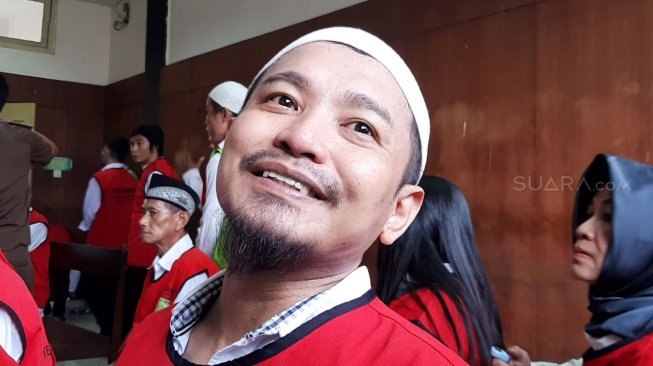 Zul Zivilia sebelum menjalani sidang di PN Jakarta Utara, Senin (30/9/2019). [Sumarni/Suara.com]