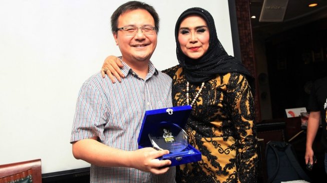 Dian Piesesha bersaa boss JK Record, Leonardo Kristianto alias Nyok. [dokumentasi pribadi]