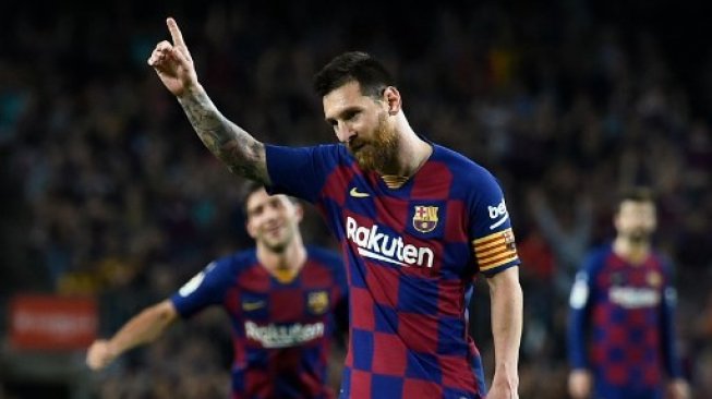 Kapten Barcelona Lionel Messi rayakan gol ke gawang Sevilla di ajang La Liga yang berlangsung di Camp Nou [AFP]