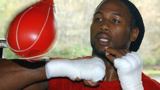 Mantan juara dunia tinju kelas berat asal Inggris, Lennox Lewis. [AFP/Henny Ray Abrams]