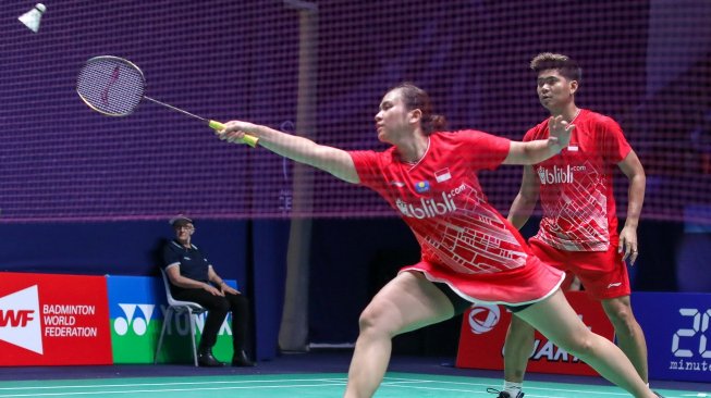 Pasangan ganda campuran Indonesia, Praveen Jordan/Melati Daeva Oktavianti, melaju ke babak kedua French Open 2019 usai menang atas Tang Chun Man/Tse Ying Suet (Hong Kong), Rabu (23/10). [Humas PBSI]