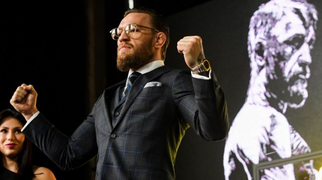 Petarung MMA asal Irlandia, Conor McGregor, dalam acara konferensi pers di Moskow Rusia, Kamis (24/10/2019). [AFP/Kirill Kudryavtsev]