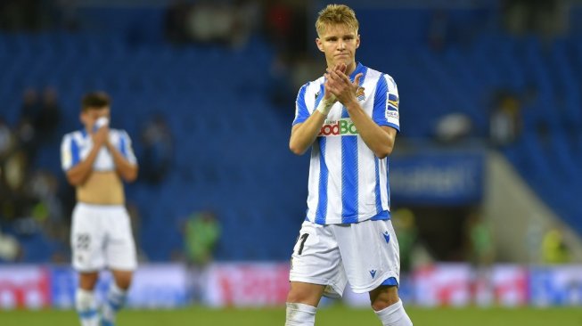 Gelandang serang Real Sociedad yang dipinjam dari Real Madrid, Martin Odegaard. [ANDER GILLENEA / AFP]