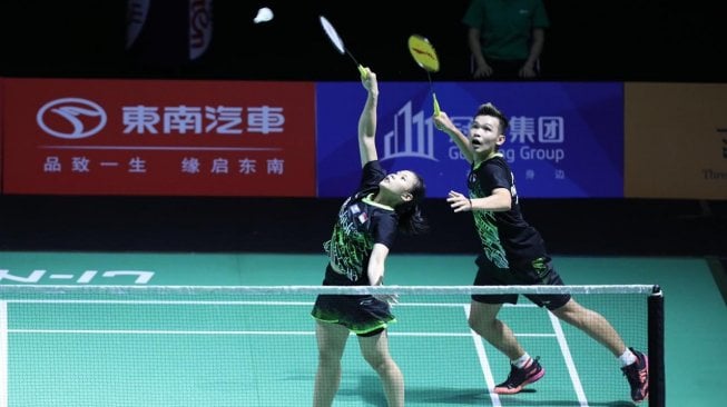 Pasangan ganda campuran Indonesia, Rinov Rivaldy/Pitha Haningtyas Mentari, melaju ke babak kedua Fuzhou China Open 2019 usai menaklukkan wakil Jepang, Yuki Kaneko/Misaki Matsutomo, Selasa (5/11). [Humas PBSI]