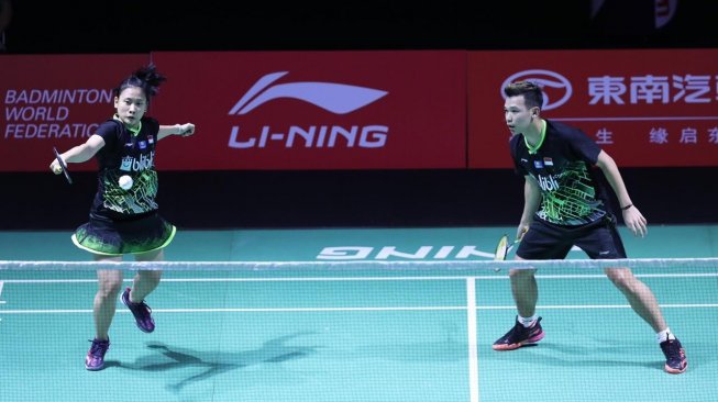 Pasangan ganda campuran Indonesia, Rinov Rivaldy/Pitha Haningtyas Mentari, melaju ke babak kedua Fuzhou China Open 2019 usai menaklukkan wakil Jepang, Yuki Kaneko/Misaki Matsutomo, Selasa (5/11). [Humas PBSI]