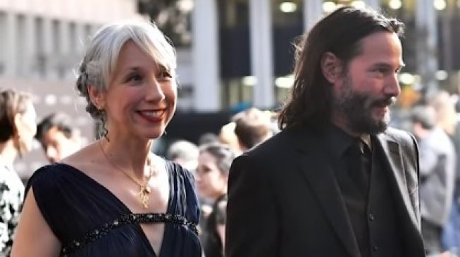 Keanu Reeves dan Alexandra Grant. (Youtube/Accsess)