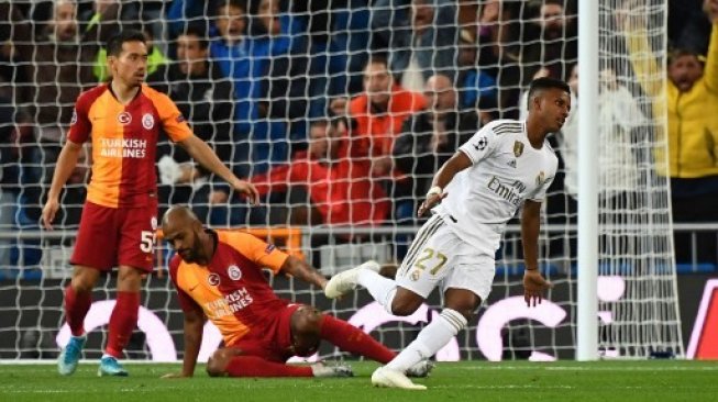 Striker Real Madrid, Rodrygo Goes sukses mencetak tiga gol alias hattrick ke gawang Galatasaray di Liga Champions. (GABRIEL BOUYS / AFP)