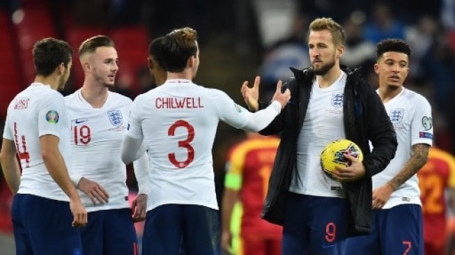 Selebrasi para pemain Timnas Inggris usai melumat Montenegro 7-0. (GLYN KIRK / AFP)