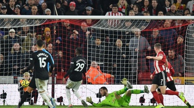 Laga Sheffield United vs Manchester United berakhir imbang 3-3 di laga lanjutan Liga Inggris, Senin (25/11/2019). (Foto: AFP)