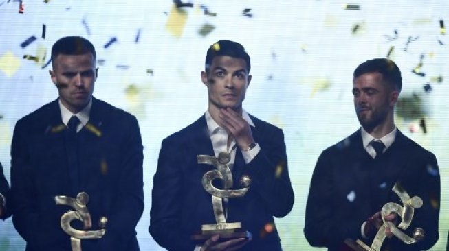 Cristiano Ronaldo saat meraih gelar pemain terbaik Serie A Italia 2018/2019. (MIGUEL MEDINA / AFP)