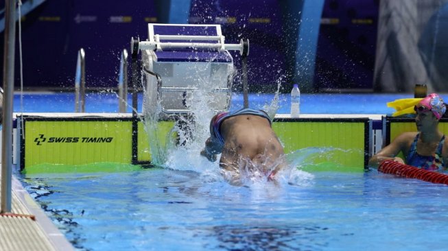 Perenang putra andalan Indonesia, I Gede Siman Sudartawa berlatih di kolam renang New Clark City Aquatic Center, Senin (2/12/2019). [Dok. PRSI]