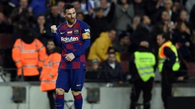 Kekinian Lionel Messi membukukan hat-trick ke-35 nya ke gawang Real Mallorca. (JOSEP LAGO / AFP)