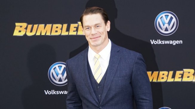 Pegulat, aktor, presenter, dan rapper, John Cena saat menghadiri film bertema otomotif, Bumblebee, 2018 [Shutterstock].