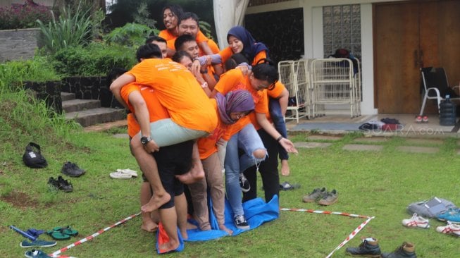 Suasana Gathering Arkadia Digital Media di Camp Hulu Cai, Ciawi, Bogor, Jawa Barat, Jumat (13/2/2019). [Suara.com/ Alfian Winanto]