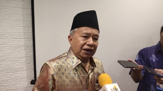 Ketua Biro Hubungan Luar Negeri dan Kerja Sama Internasional PP Muhammadiyah KH Muhyiddin Junaidi. (Suara.com/Ria Rizki).