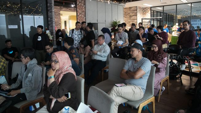 Suasana konferensi pers aplikasi Netzme di Satrio Tower, Kuningan, Jakarta Selatan, Kamis (26/12). [Suara.com/Alfian Winanto]