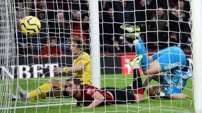 Gelandang AFC Bournemouth menjebol gawang Arsenal dalam pertandingan Liga Inggris, Kamis (26/12/2019) [AFP]