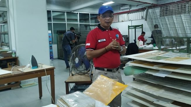 Hati-hati, Begini Proses Restorasi Surat Berharga Basah Akibat Banjir