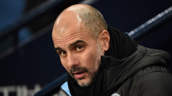 Manajer Manchester City, Pep Guardiola. [OLI SCARFF / AFP]
