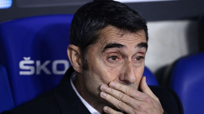 Pelatih Barcelona, Ernesto Valverde. [PAU BARRENA / AFP]