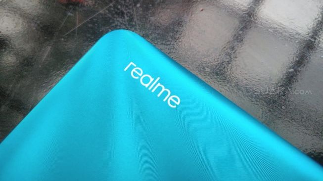 Logo Realme. [Suara.com/Tivan Rahmat]