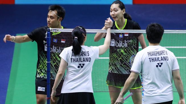 Pasangan ganda campuran Indonesia, Hafiz Faizal/Gloria Emanuelle Widjaja, melaju ke babak kedua Thailand Masters 2020 usai lawan mereka, Nipitphon Phuangphuapet/Savitree Amitrapai (Thailand), mengundurkan diri, Rabu (22/1). [Humas PBSI]