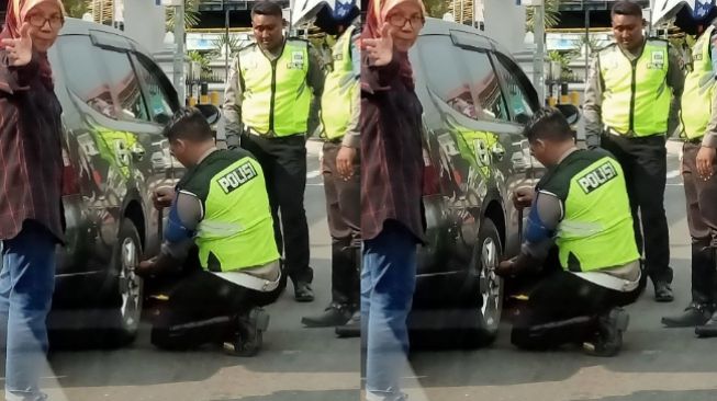 Bantu Ganti Ban di Jalan, Polisi di Jogja Ini Viral