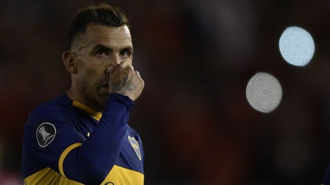 Penyerang Boca Juniors, Carlos Tevez. [JUAN MABROMATA / AFP]