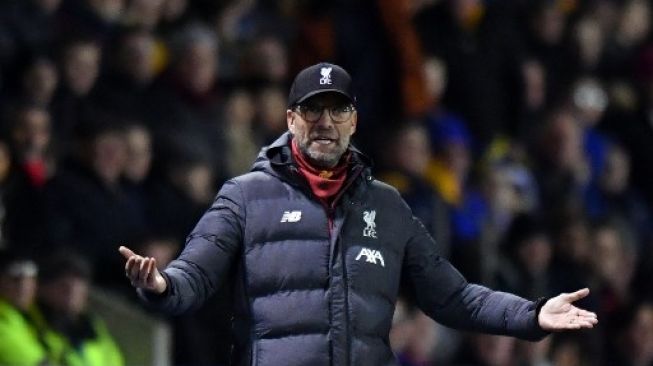Reaksi manajer Liverpool Jurgen Klopp di pinggir lapangan saat skuatnya menghadapi Shrewsbury Town di babak keempat Piala FA. Anthony Devlin / AFP 