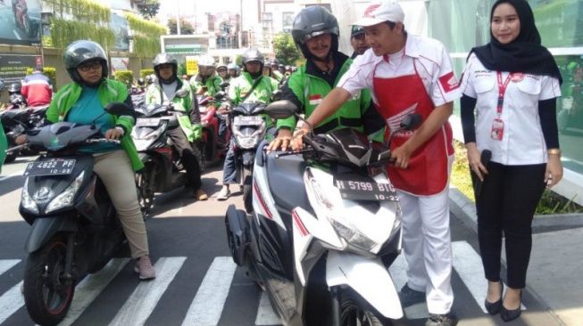 Kerja sama Gojek dan Astra Motor Jawa Tengah untuk mitra driver [ANTARA Foto].