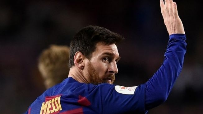Bintang Barcelona Lionel Messi merayakan golnya ke gawang Leganes di laga Copa del Rey di Camp Nou. Josep LAGO / AFP