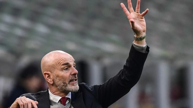 Pelatih AC Milan, Stefano Pioli. [Miguel MEDINA / AFP]