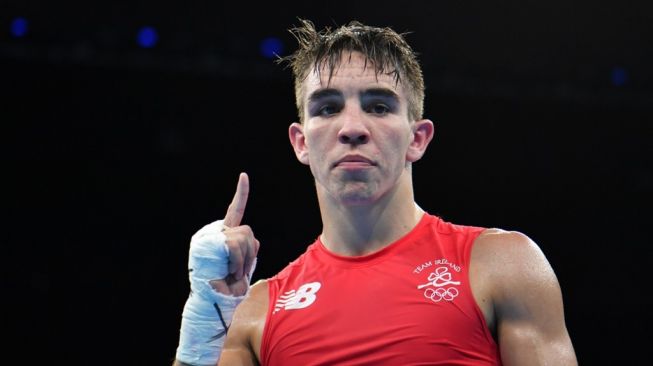 Petinju Irlandia Michael Conlan merayakan kemenangan melawan Aram Avagyan (Armenia) pada kelas bantam (56 kg) putra Olimpiade 2016 Rio de Janeiro, Brasil, 14 Agustus 2016. [AFP/Yuri Cortez]