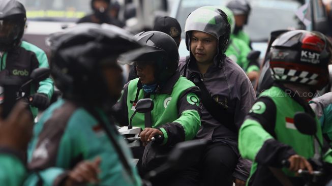 Cerita Driver Ojol Ditengah Wabah Corona, Jual Masker Demi Penuhi Kebutuhan - SuaraJogja.ID