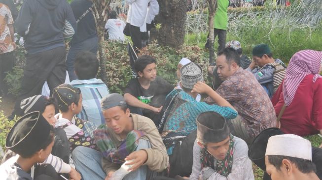 Komisioner KPAI Jasra Putra terjun ke lokasi aksi demonstrasi bertajuk 'Aksi 212 Berantas Mega Korupsi Selamatkan NKRI' untuk melakukan pengawasan. (Foto dok. pribadi)