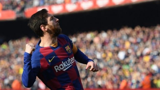 Pemain Barcelona Lionel Messi rayakan gol ke gawang Eibar dalam pertandingan La Liga yang berlangsung di Camp Nou, Sabtu (22/2/2020). [AFP]