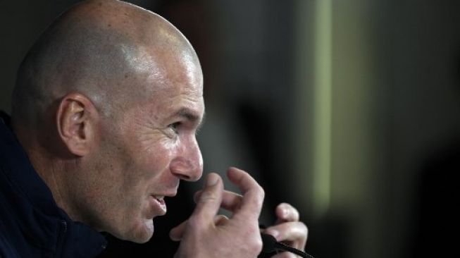 Pelatih Real Madrid Zinedine Zidane hadiri jumpa pers jelang pertandingan leg pertama babak 16 besar Liga Champions kontra Man City di Santiago Bernabeu, Selasa (25/2/2020). [AFP]
