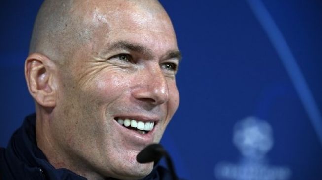 Pelatih Real Madrid Zinedine Zidane hadiri jumpa pers jelang pertandingan leg pertama babak 16 besar Liga Champions kontra Man City di Santiago Bernabeu, Selasa (25/2/2020). [AFP]