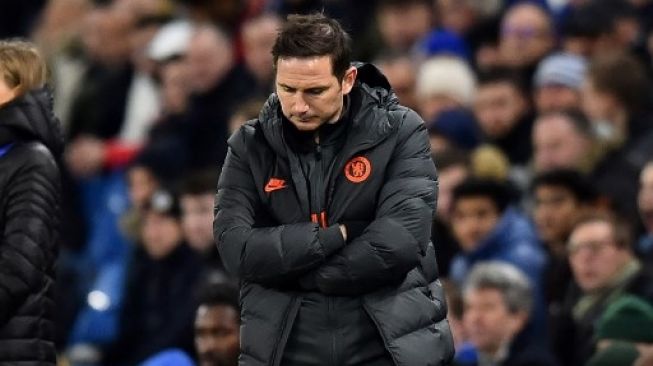 Reaksi Manajer Chelsea Frank Lampard di pinggir lapangan setelah skuatnya kalah dari Bayern Munich di leg pertama babak 16 besar Liga Champions di Stamford Bridge. Glyn KIRK / AFP