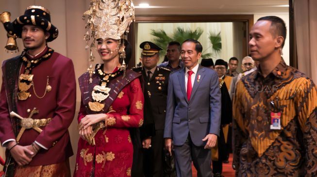 Presiden Republik Indonesia Joko Widodo saat menghadiri acara Laporan Tahunan Mahkamah Agung 2019 di Jakarta Convention Center (JCC) Senayan, Jakarta, Rabu (26/02). [Suara.com/Alfian Winanto]
